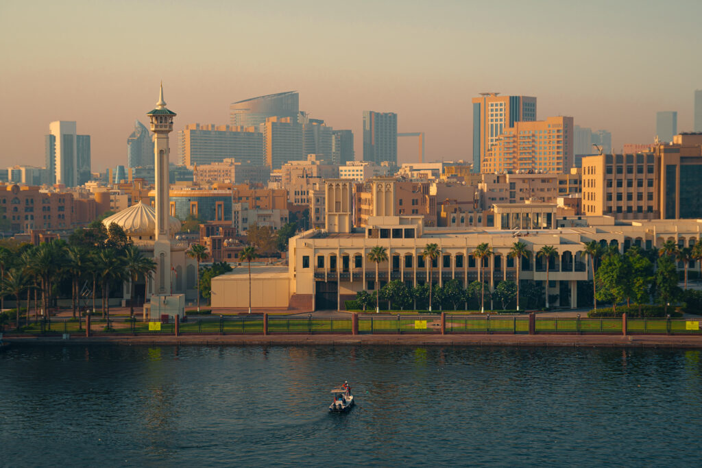 Skyscrapers along Dubai Creek at sunrise